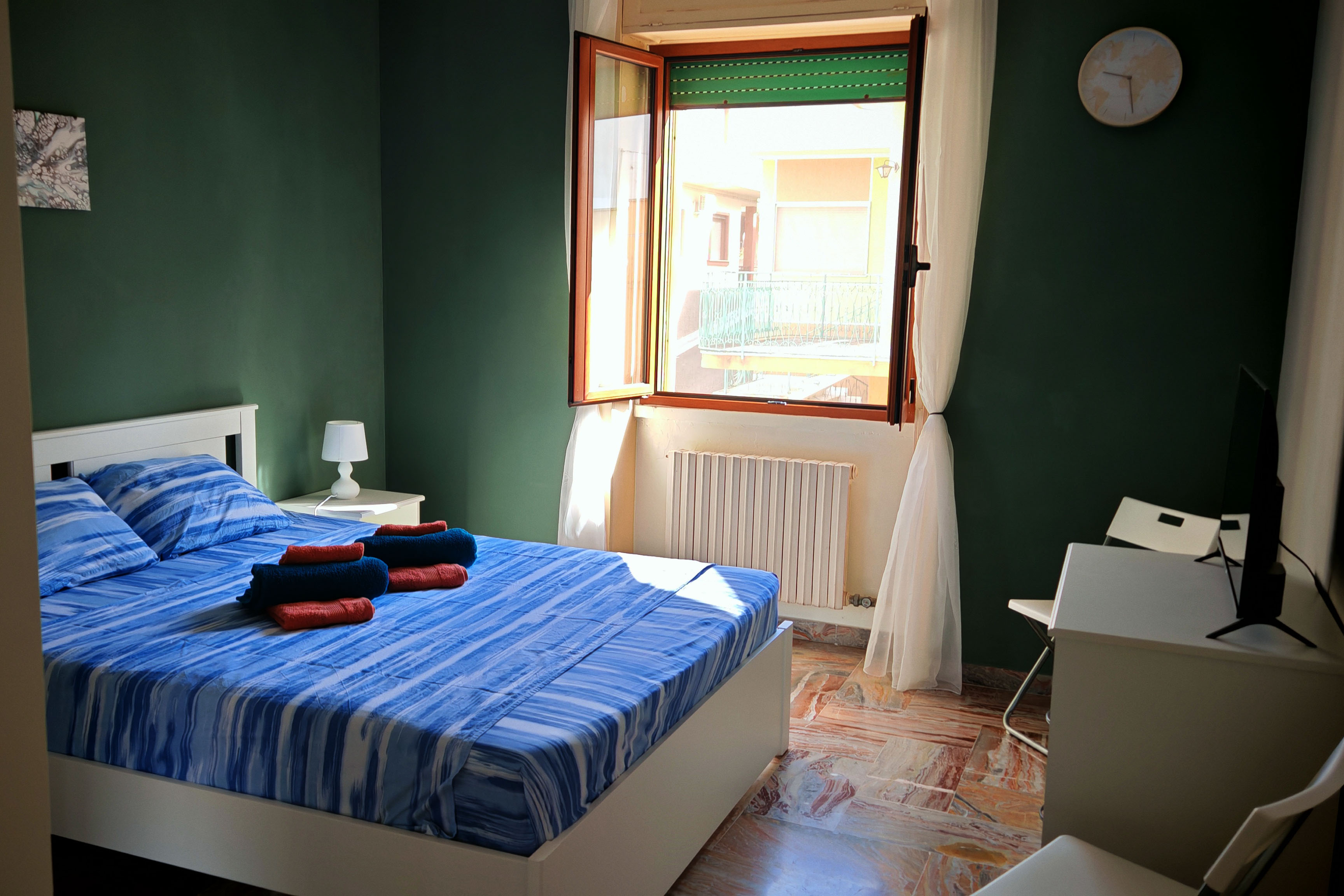 Bedroom with queen-size bed and air conditioning